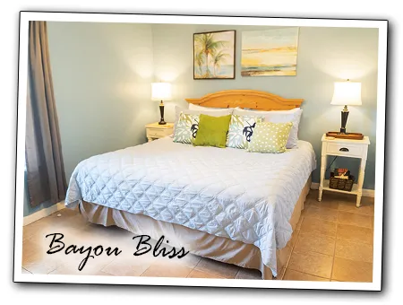 the bedroom of Bayou Bliss condo